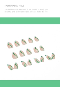 Detail view of almond press-on nails with green and white French wave patterns