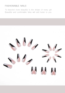 Detail view of long ballet press on nails with pink and black geometric pattern designs