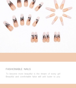 Detail of long ballerina press on nails with pink base and black butterfly design