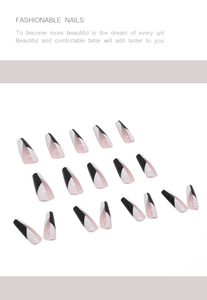 Flat lay of long ballerina press-on nails with black, white and nude geometric design