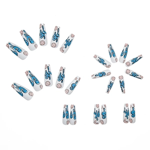 Long ballet press-on nails with blue graffiti and pink cookie design on matte white