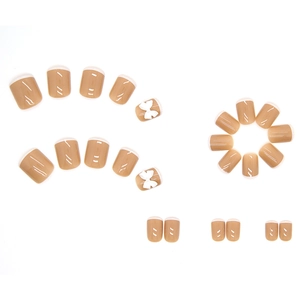 Faux ongles French nude et blanc avec nœuds 3D décoratifs et finition brillante