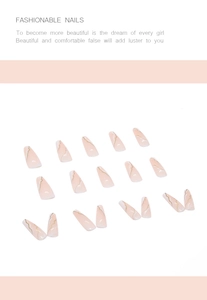Long ballerina press-on nails set with nude pink base and gold marble wave details