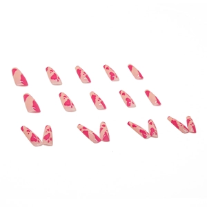 Long almond press-on nails with nude base and pink abstract cow print patterns