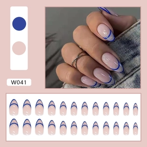 Short almond nude press-on nails with royal blue French tips in 24-piece full set