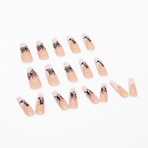 French press-on nails with white tips, black butterfly patterns and long coffin shape