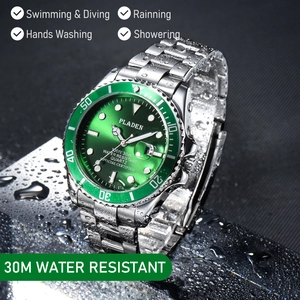 Detailed view of the green sunray dial and rotating bezel on a steel diving watch