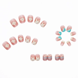 Cute cartoon press-on nails with pink base, white rabbits, clouds and blue heart patterns