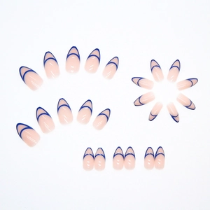 Short almond press-on nails with nude pink base and blue double French tip design