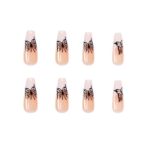Long coffin press on nails featuring nude pink base and black butterfly wing designs