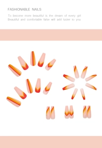 Macro detail of long coffin nails with retro red and orange geometric V-stripes