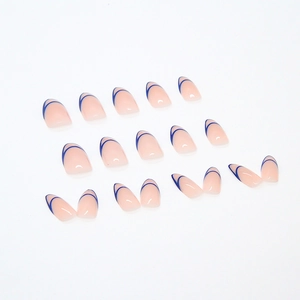 Short almond press-on nails with nude pink base and navy blue French tip curves