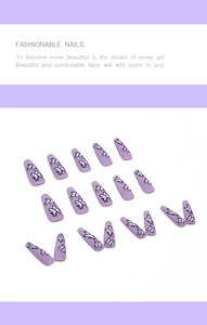 Detail of purple matte coffin nails featuring elegant black and white butterfly patterns