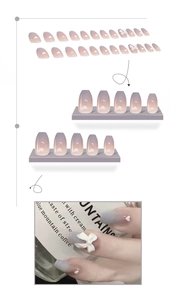 Detailed view of blue gradient press-on nails with 3D bows and heart accents