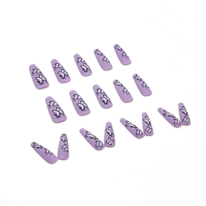 Long ballet press-on nails in matte lavender purple with black and white butterfly patterns