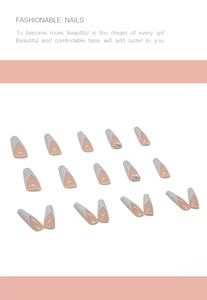 Detail of long ballet press-on nails with French lace design and sparkling rhinestones