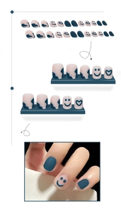 Detailed view of matte heart and smiley face press-on nails in dusty blue and grey pink