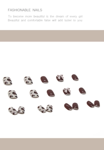 Détail d'ongles léopard avec pointes marron et accents de nœuds en relief
