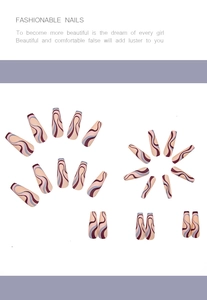 Detailed flat lay of long coffin press-on nails with colorful wavy line art patterns