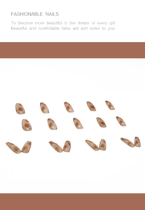 Detailed set of 18 translucent amber press-on nails with a glossy finish and coffin shape