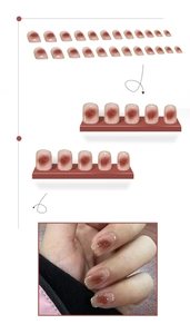Détail de faux ongles courts dégradés blush avec bords dorés scintillants et kit 24 pièces