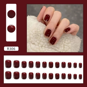 Short square burgundy press-on nails with silver glitter edges and full 24-piece set