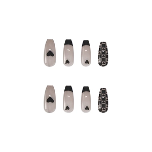Long ballet press-on nails with black checkerboard and heart designs on white background