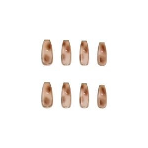 Classic amber tortoiseshell press-on nails in long coffin shape with glossy resin finish