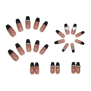 French black long press-on nails set with rhinestones and heart chain accents