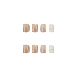 Press-on nails with nude marble dye and white nails featuring gold wave line accents