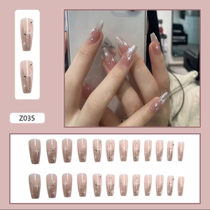 Star-patterned translucent pink coffin press-on nails with silver glitter and rhinestones