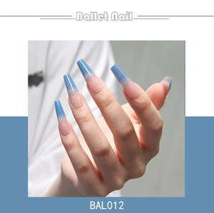 Detail showing long ombre ballet press on nails with pink to sky blue gradient finish