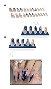 Detailed view of long coffin press-on nails with blue and white marble pattern design