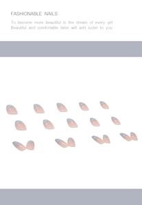 Macro detail of ballerina press-on nails with blue-pink gradient and white star patterns