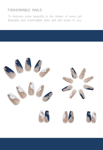 Detail of long coffin press-on nails with blue and nude abstract wave marble patterns