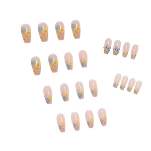 Floral ballerina press-on nail kit with blue butterflies and colorful daisy patterns