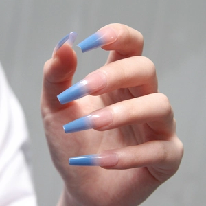 Long coffin press on nails featuring elegant blue to pink gradient glossy finish