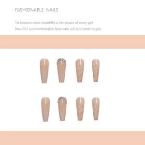 Long ballerina press-on nails with nude pink marble design and rhinestone accents