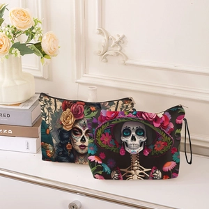 Two-piece Day of the Dead makeup bag set with skull patterns and zipper closure