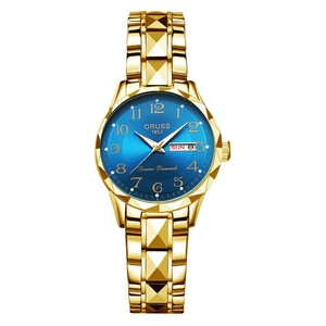Dettaglio dell'orologio in oro con quadrante blu e doppia finestra del calendario