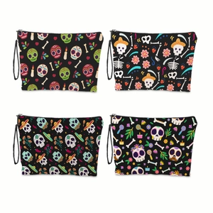 Lot de quatre trousses de toilette Jour des Morts avec motifs de crânes et fermetures