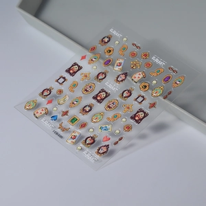 Macro shot of 3D embossed nail art stickers FEB-695 featuring vintage frames and gems
