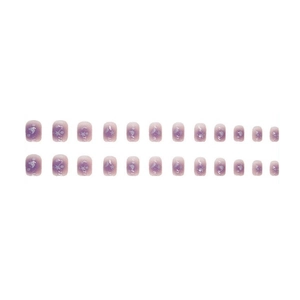 Short round purple gradient press-on nails with glitter star and moon patterns