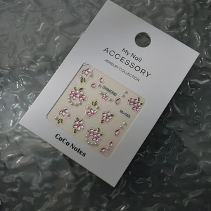 Macro view of floral nail art stickers MJ-083 featuring pink flowers and pearls