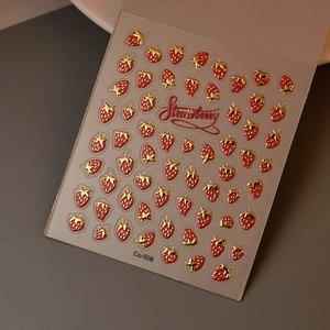 Detailed 3D embossed nail art stickers featuring red strawberry and gold leaf motifs