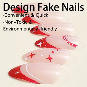 Christmas-themed press-on nails with red stars and white French lines on a nude base