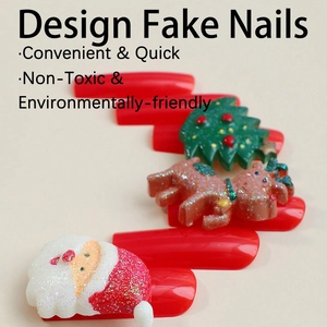 Extra long Santa Claus themed press-on nails with 3D resin candy and reindeer decor