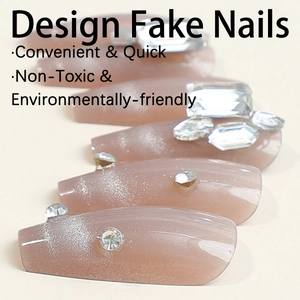 Cat eye mocha brown gradient fake nails with diamond accents in long trapezoid shape