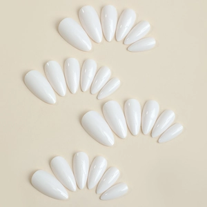 Glossy white almond shape press-on nails set displayed in four rows on beige background