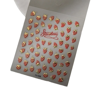 3D strawberry nail art stickers with gold trim and Strawberry text accents